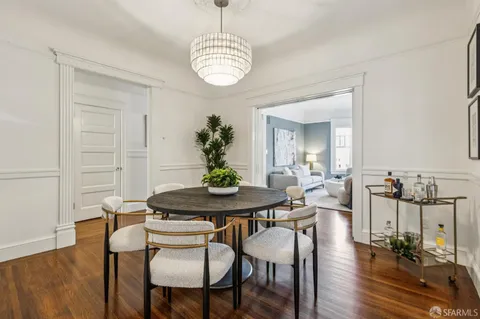 a kitchen with stainless steel appliances granite countertop a stove sink and cabinets
