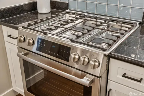 a view of a kitchen with washer and dryer