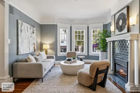 a view of livingroom with furniture and a potted plant