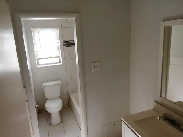 a bathroom with a toilet