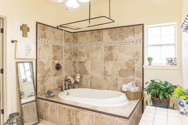a bathroom with a sink and a bathtub