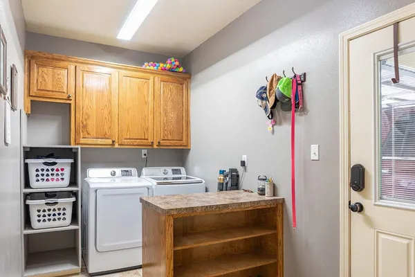 a balcony with furniture and a ceiling fan