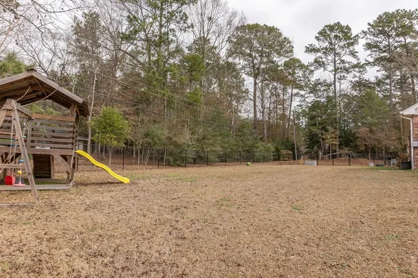 a house with yard in front of it