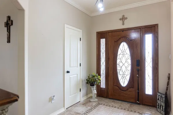 a view of entryway with washer and dryer