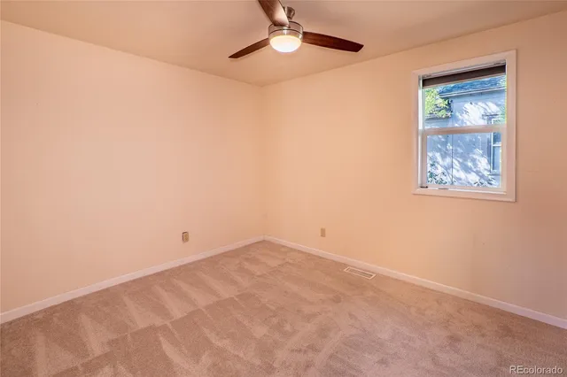a view of an empty walk in closet