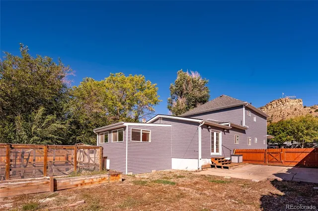 a view of house with a street