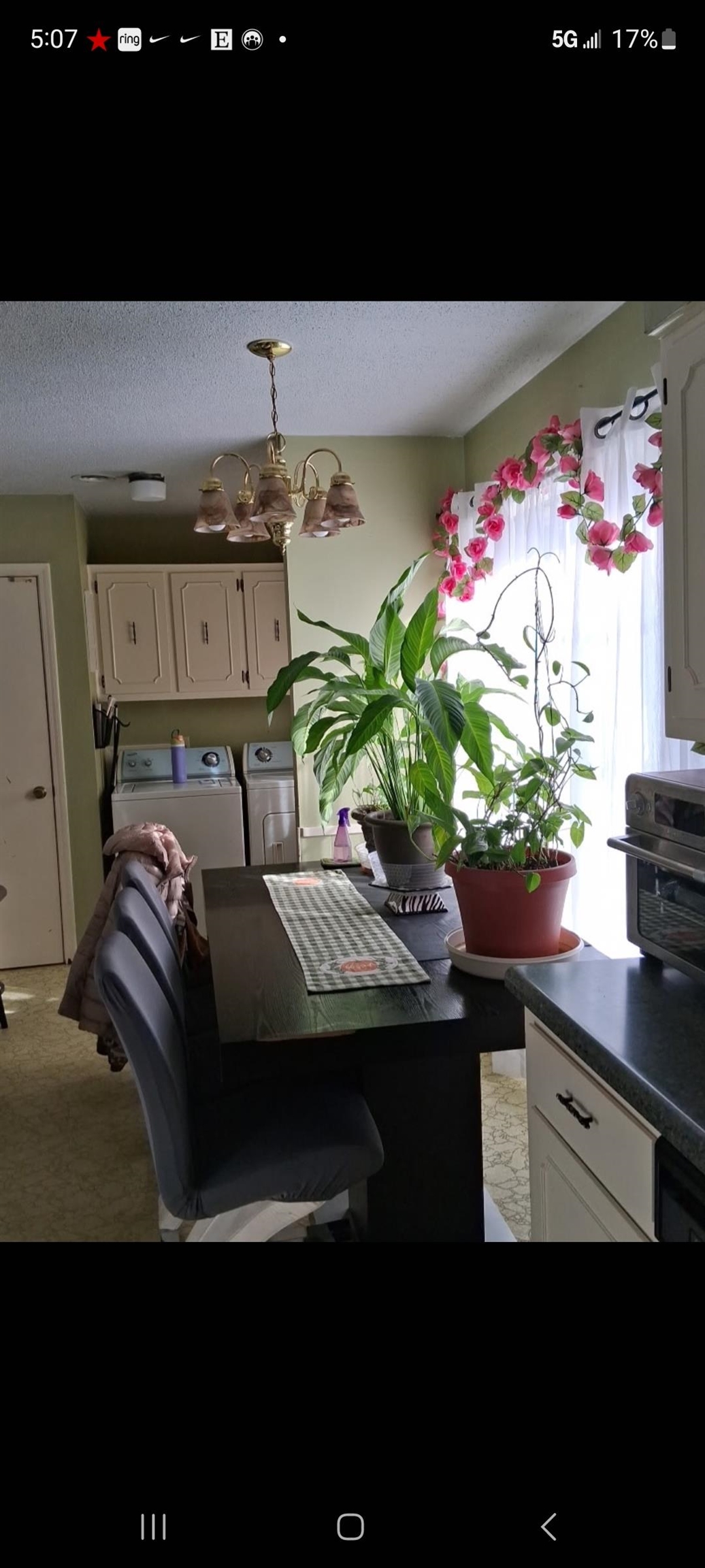 3220 Canyon Road Memphis, TN 38134 - Photo 7 of 16 Dining room featuring a textured ceiling and a chandelier