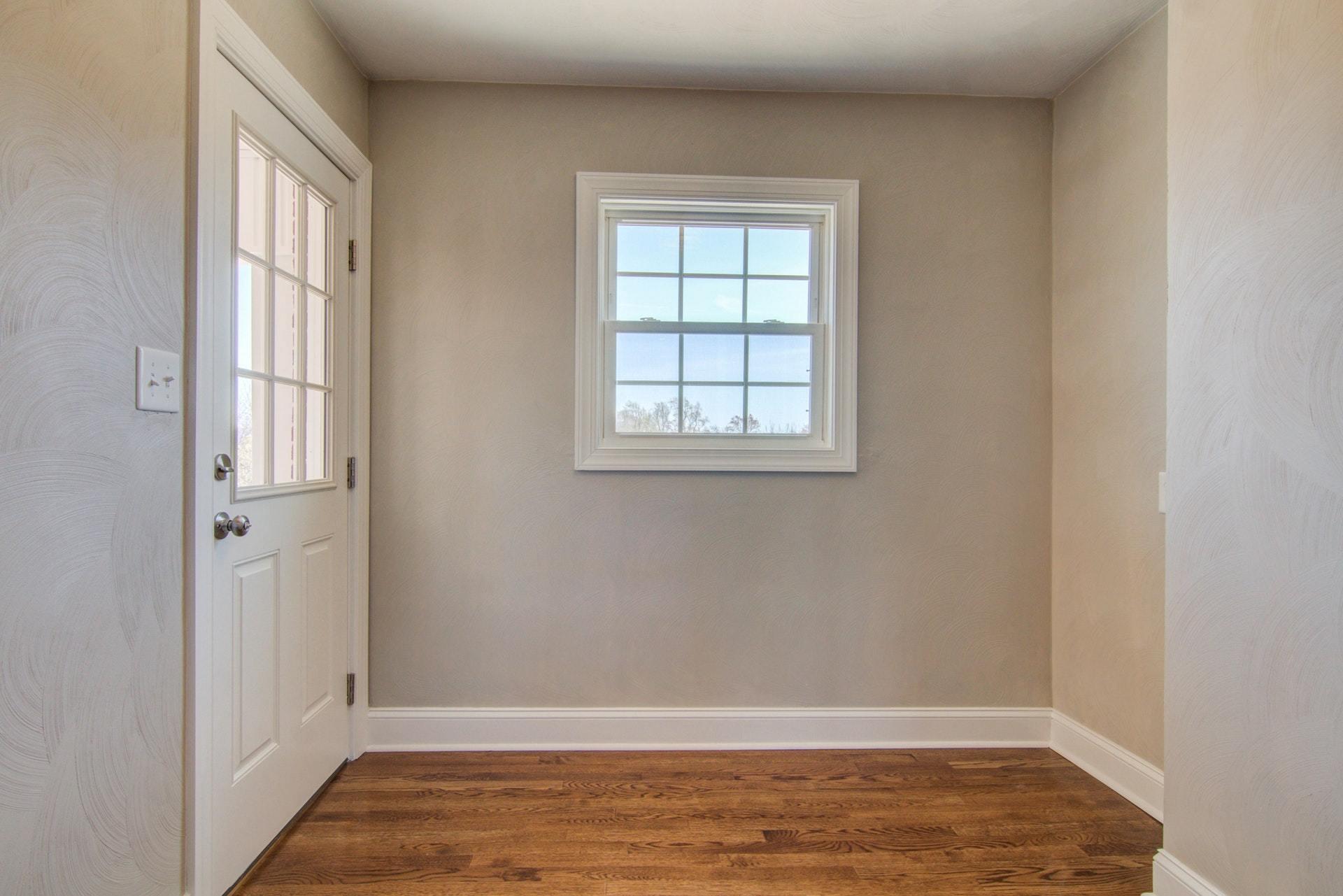 452 Lucy Wade Road Rocky Mount, VA 24151 - Photo 16 of 74 wooden floor in an empty room with a window