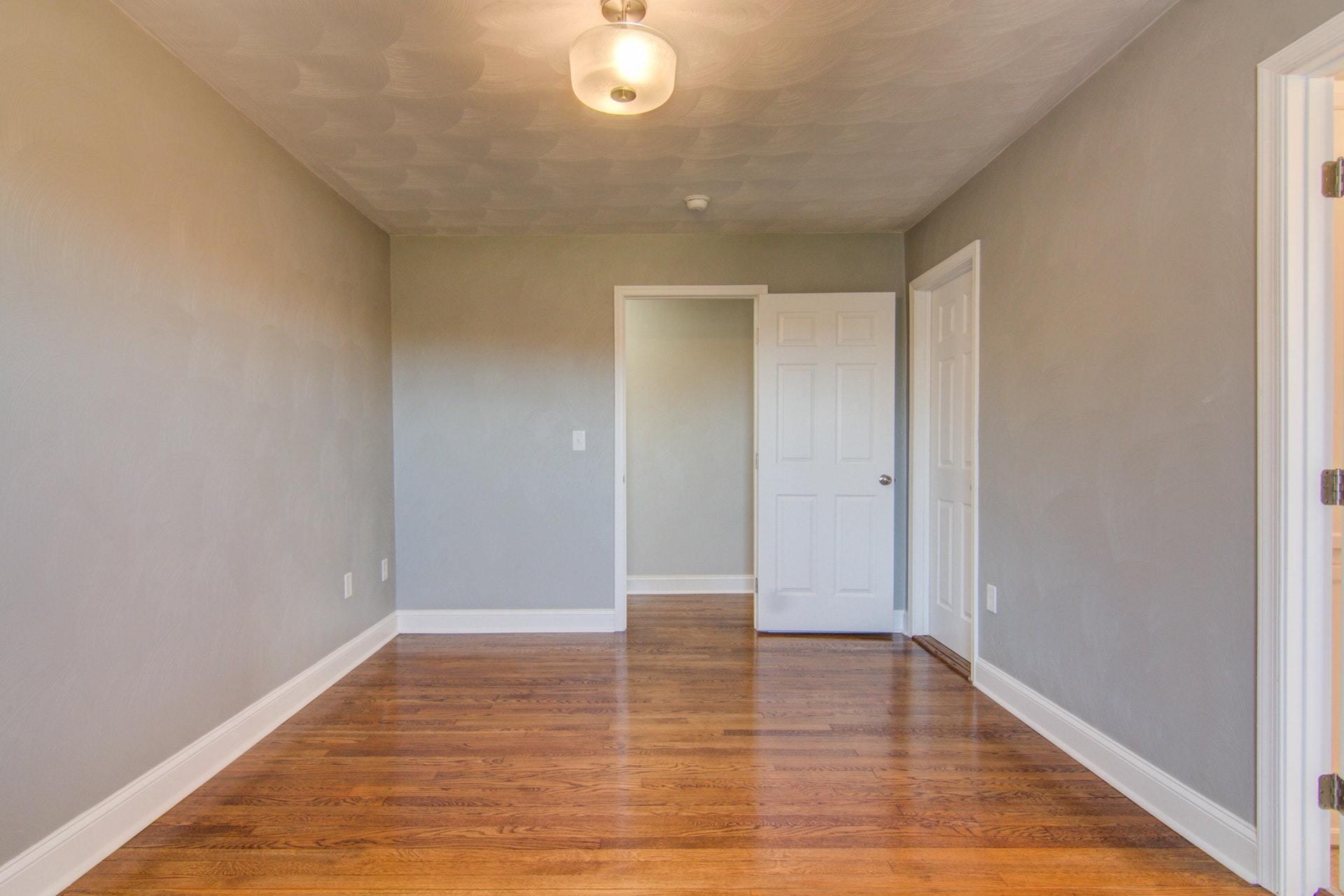 452 Lucy Wade Road Rocky Mount, VA 24151 - Photo 20 of 74 a view of an empty room with wooden floor