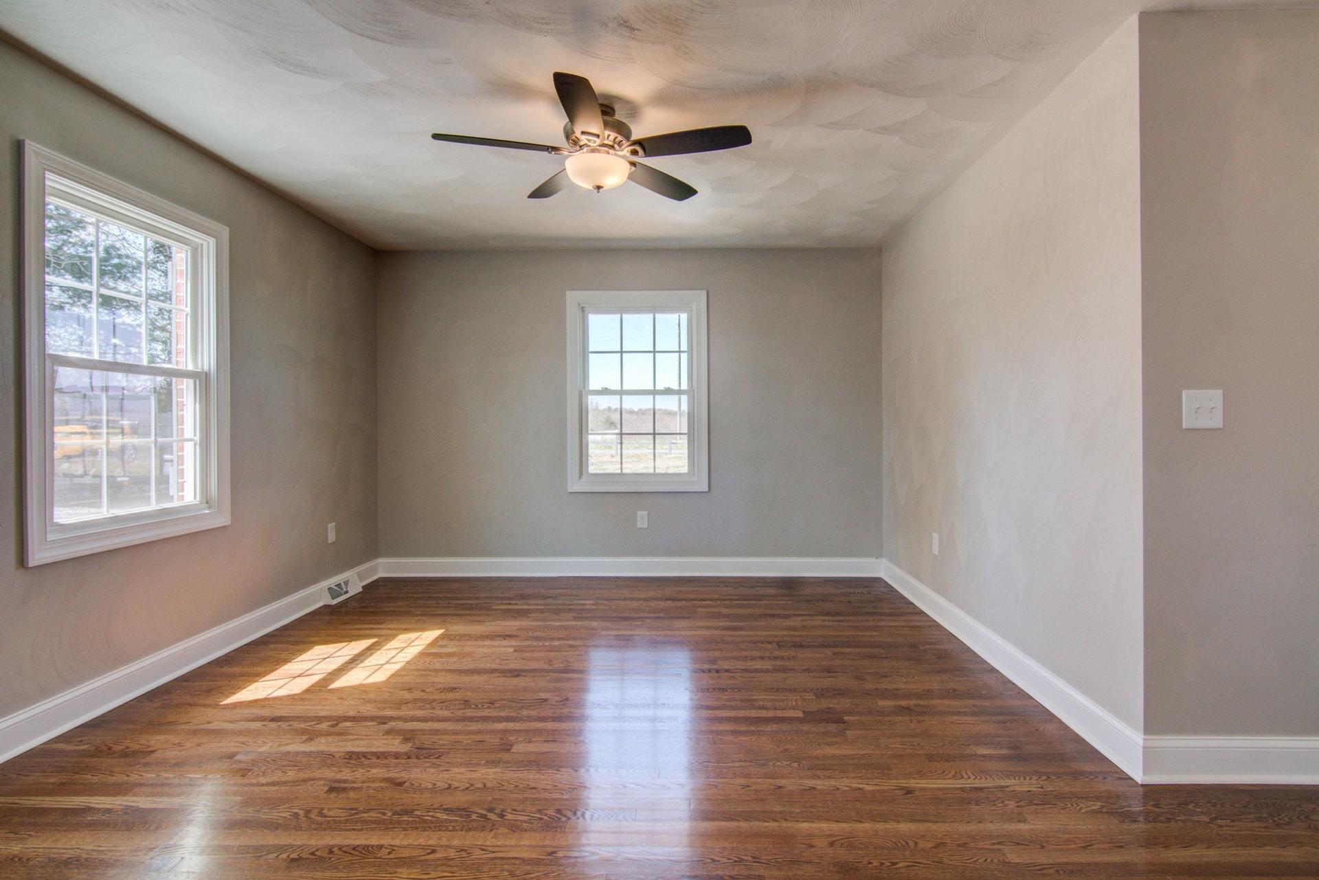 452 Lucy Wade Road Rocky Mount, VA 24151 - Photo 29 of 74 a view of empty room with wooden floor and fan