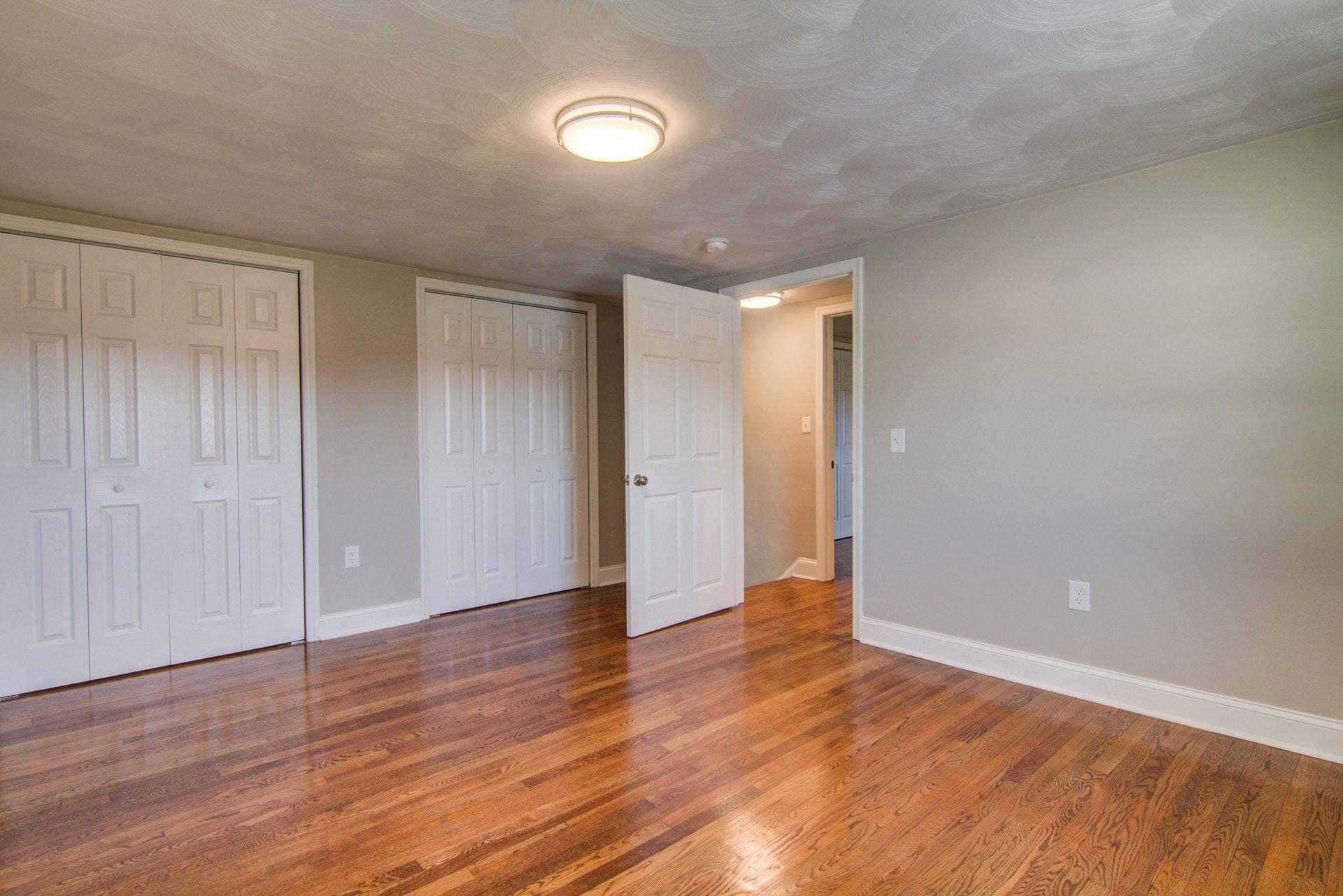 452 Lucy Wade Road Rocky Mount, VA 24151 - Photo 40 of 74 a view of an empty room with wooden floor