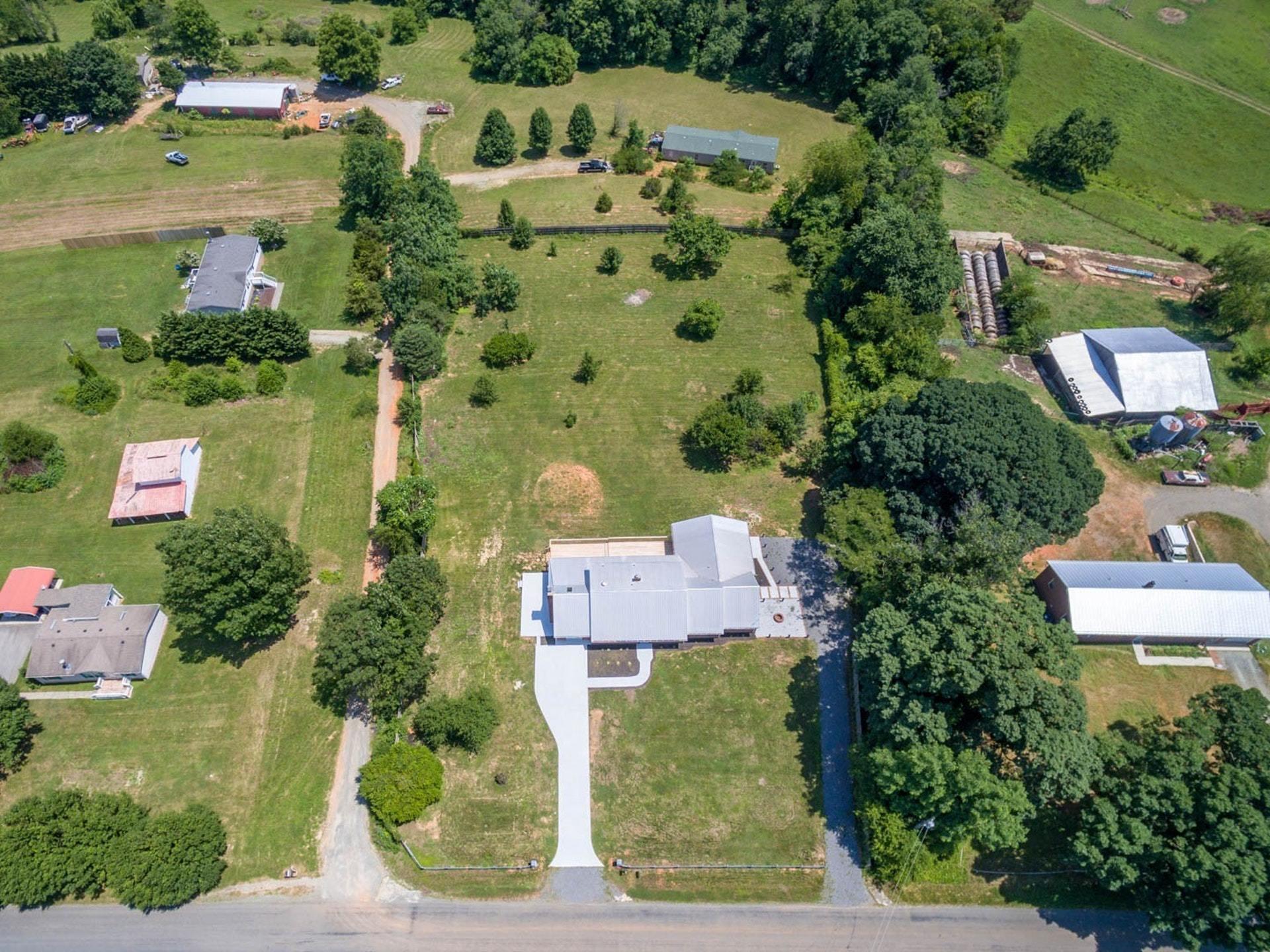 452 Lucy Wade Road Rocky Mount, VA 24151 - Photo 59 of 74 an aerial view of house with yard swimming pool and outdoor seating