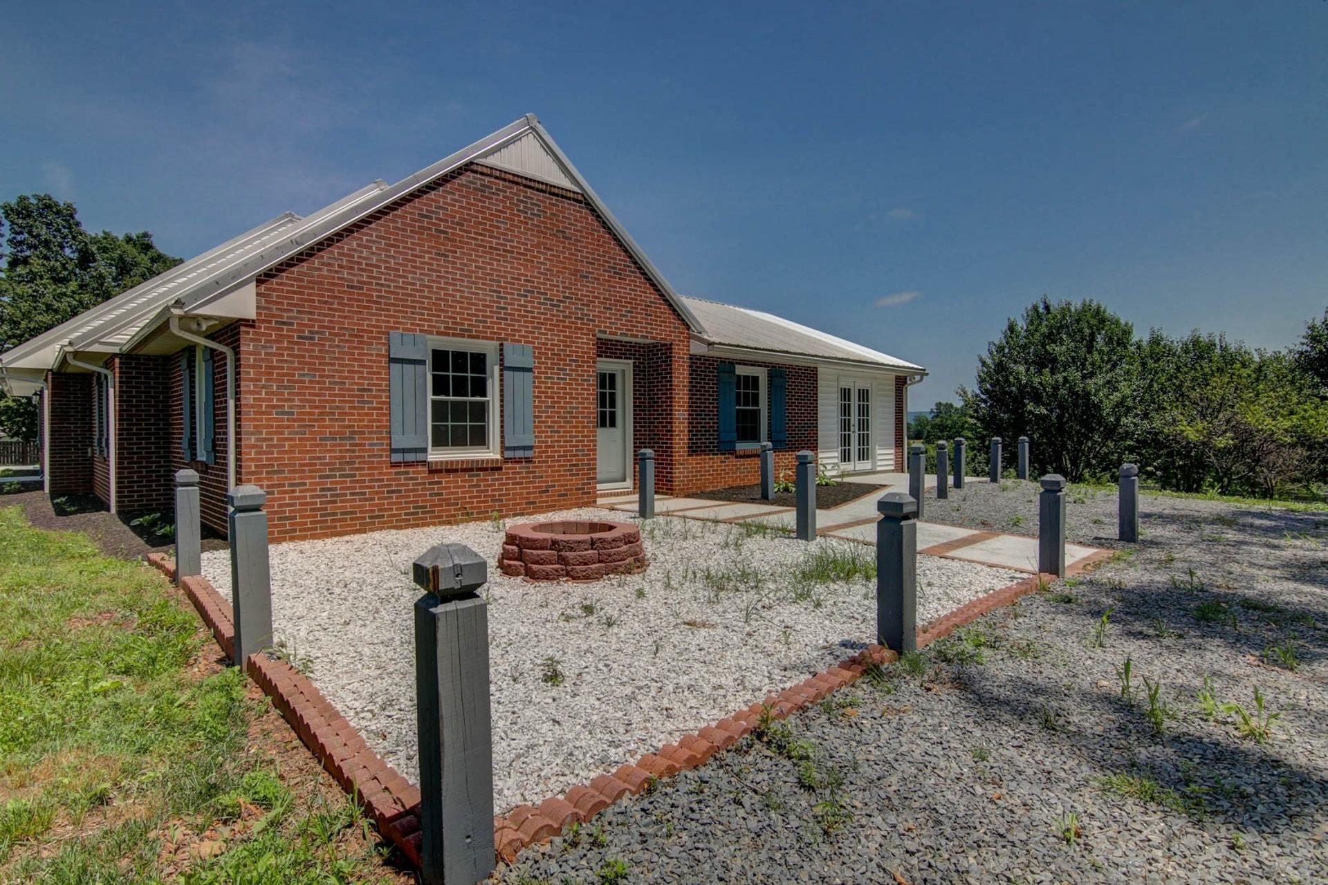 452 Lucy Wade Road Rocky Mount, VA 24151 - Photo 65 of 74 a front view of house with small garden