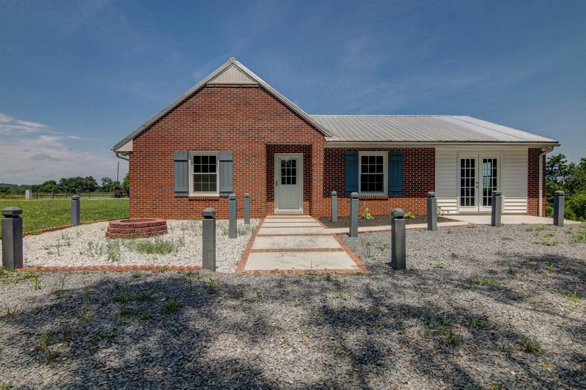 452 Lucy Wade Road Rocky Mount, VA 24151 - Photo 66 of 74 a view of a house with backyard and a garden