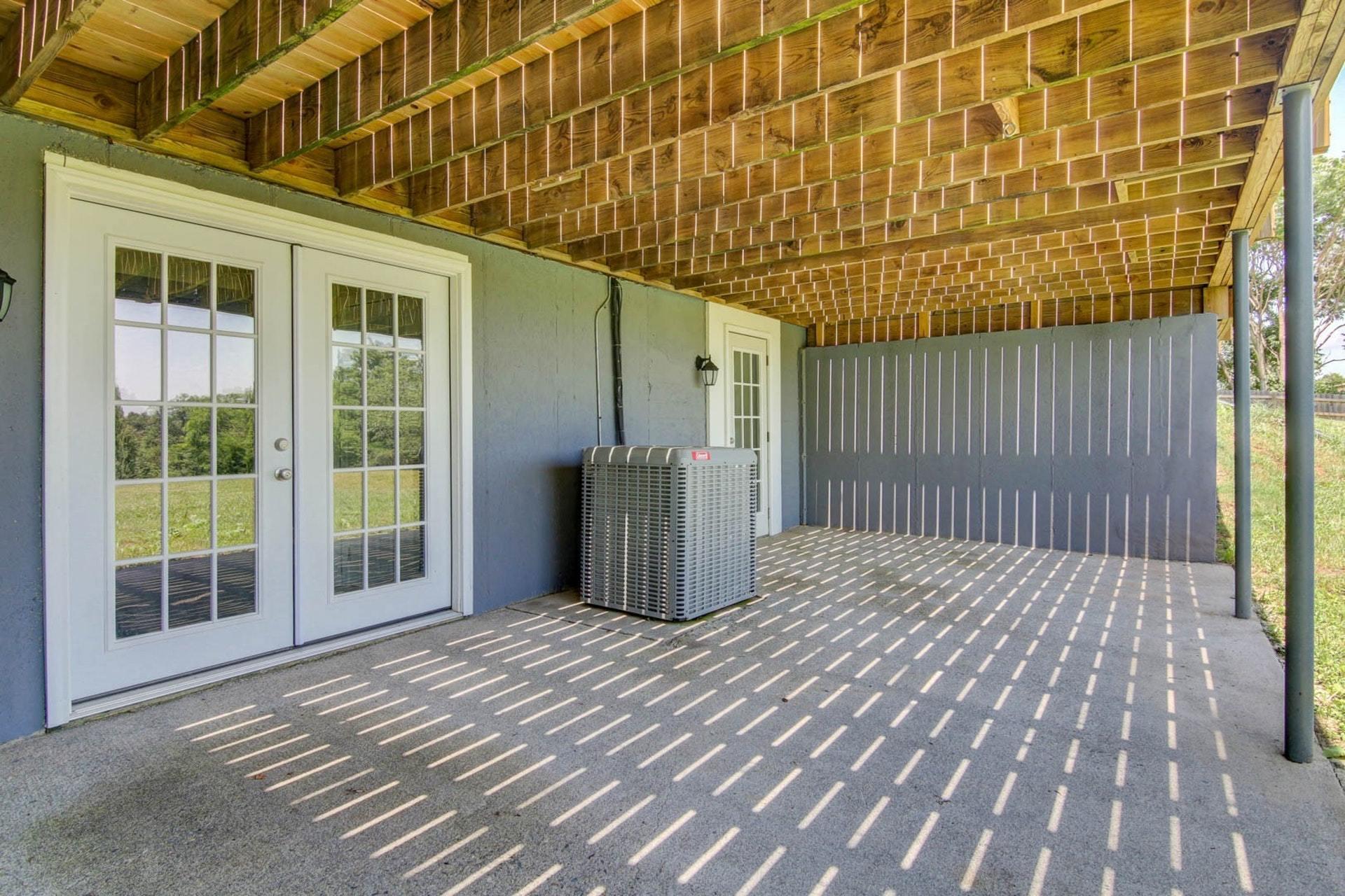 452 Lucy Wade Road Rocky Mount, VA 24151 - Photo 68 of 74 a view of a balcony with wooden floor and fence
