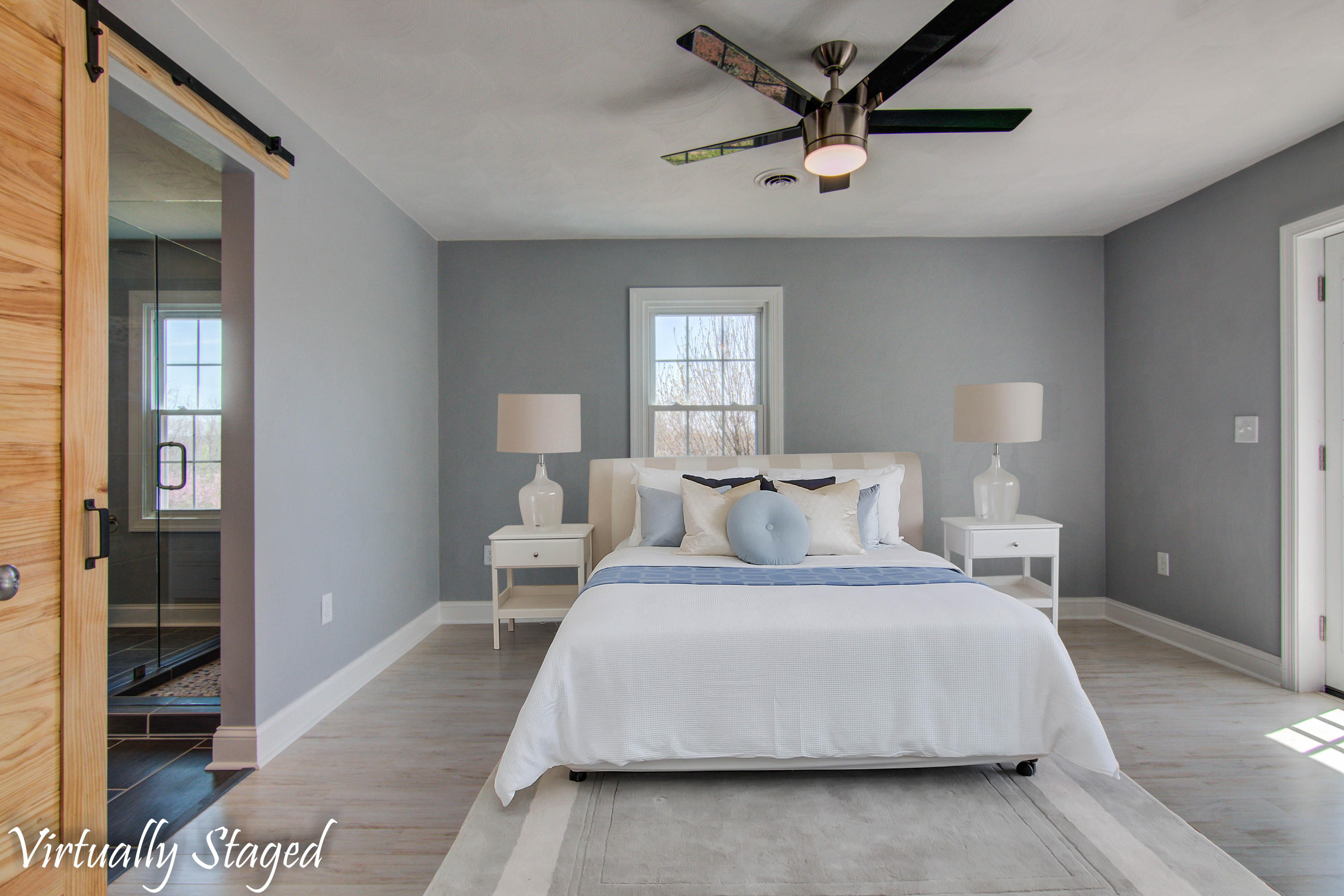 452 Lucy Wade Road Rocky Mount, VA 24151 - Photo 8 of 74 a bedroom with a bed and a lamp on a dresser