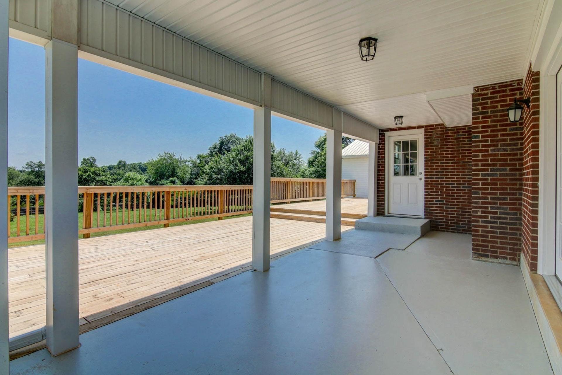 452 Lucy Wade Road Rocky Mount, VA 24151 - Photo 71 of 74 a view of hallway with wooden floor and floor to ceiling window