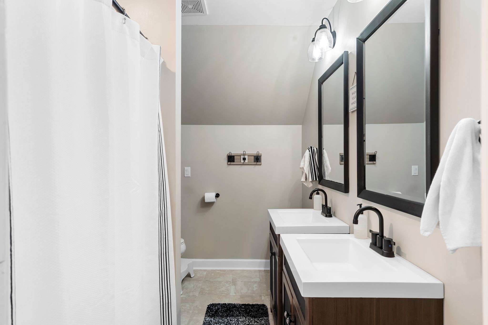 7401 Burks Hollow Road Christiana, TN 37037 - Photo 26 of 56 a bathroom with a sink and a mirror