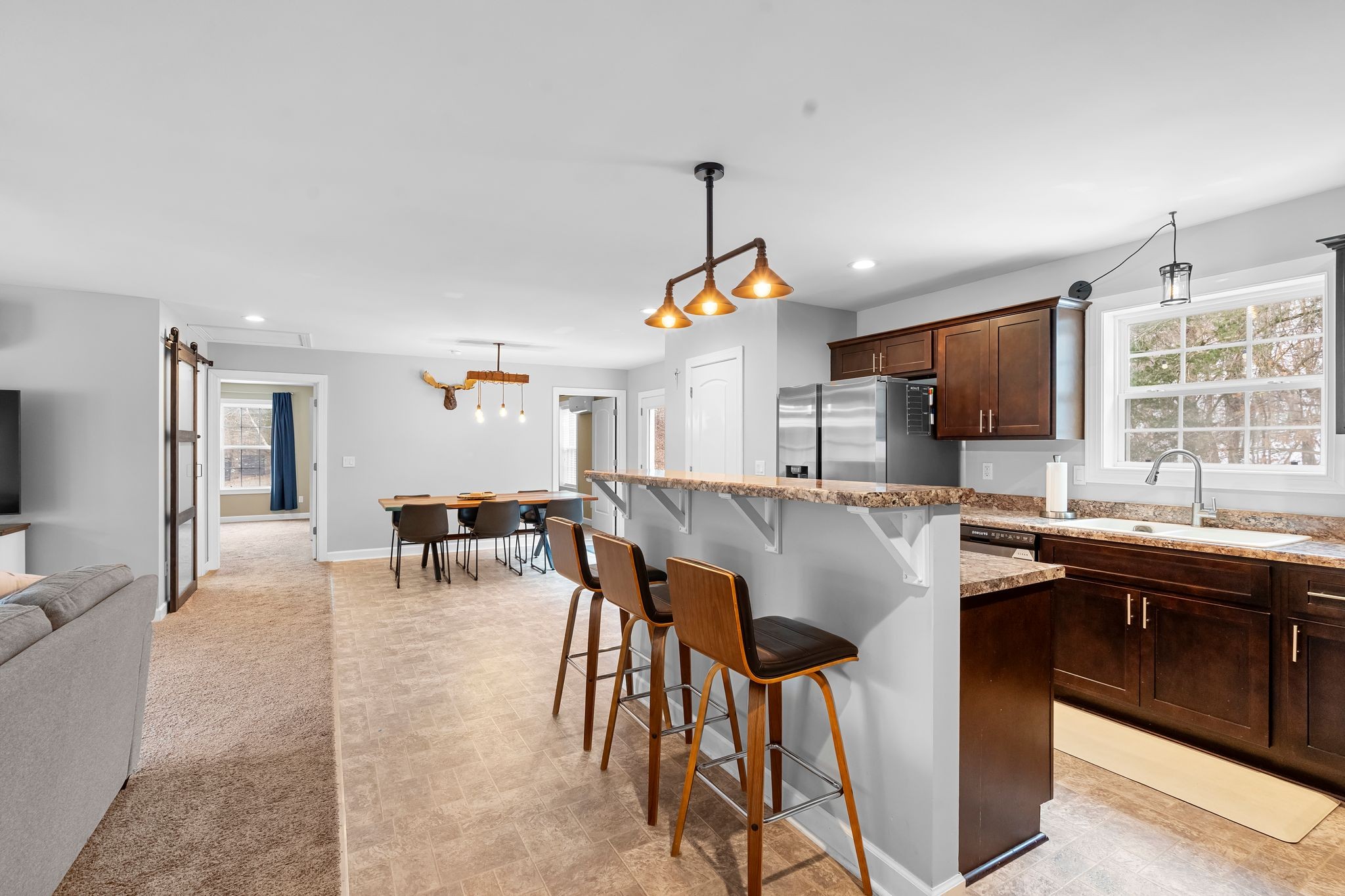 7401 Burks Hollow Road Christiana, TN 37037 - Photo 8 of 56 a kitchen with a table and chairs in it