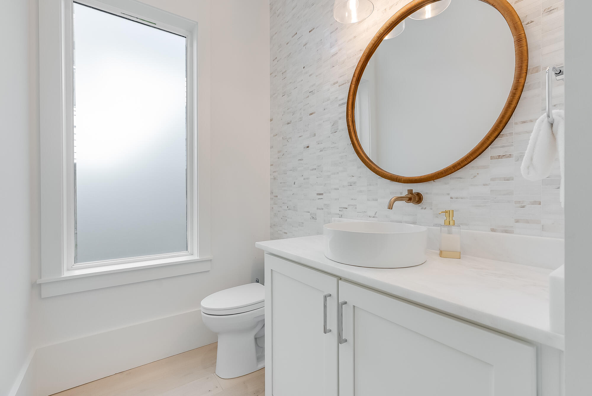 212 South Gulf Drive Santa Rosa Beach, FL 32459 - Photo 18 of 68 a bathroom with a sink and a mirror