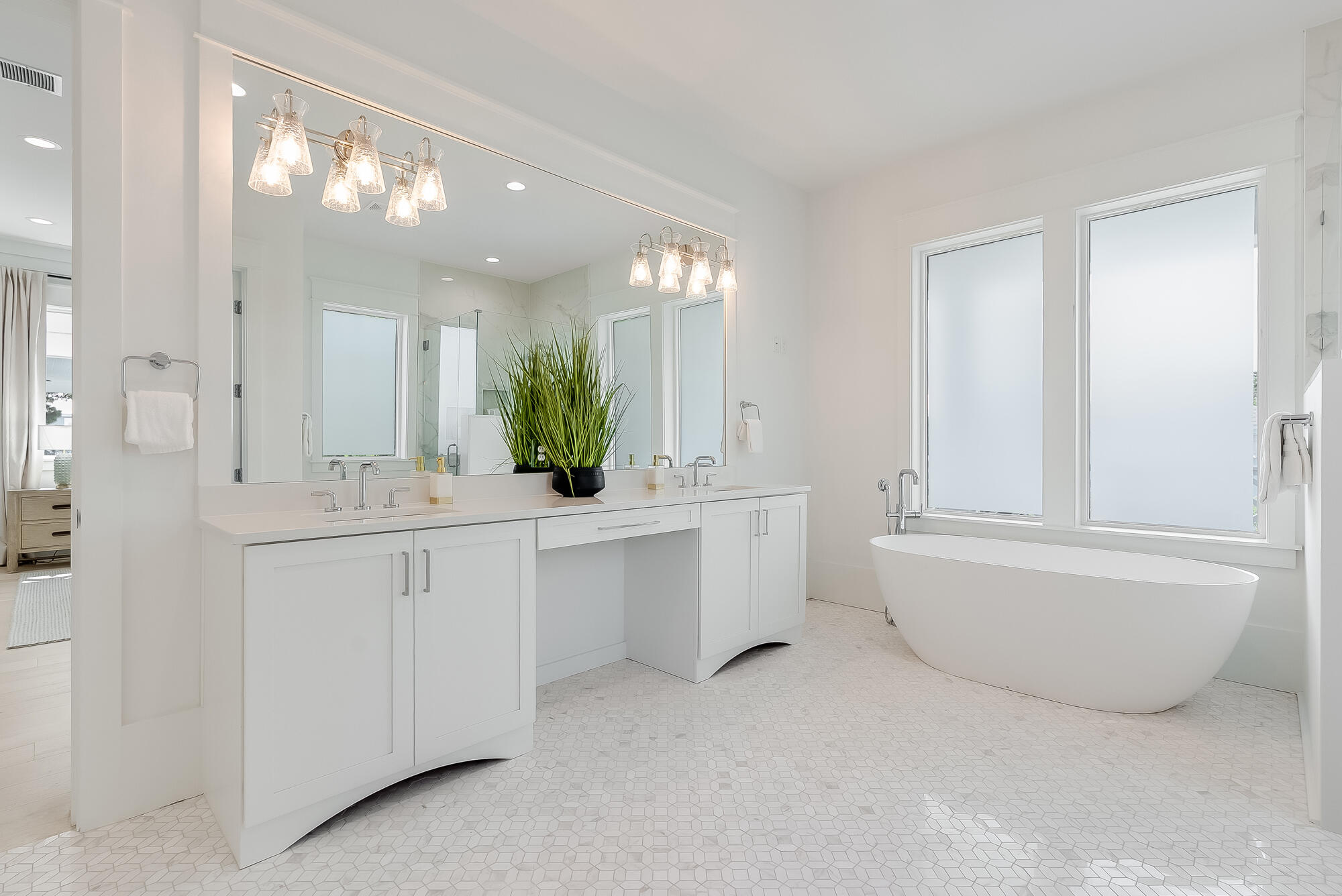 212 South Gulf Drive Santa Rosa Beach, FL 32459 - Photo 25 of 68 a bathroom with a bathtub a double vanity sink and mirror