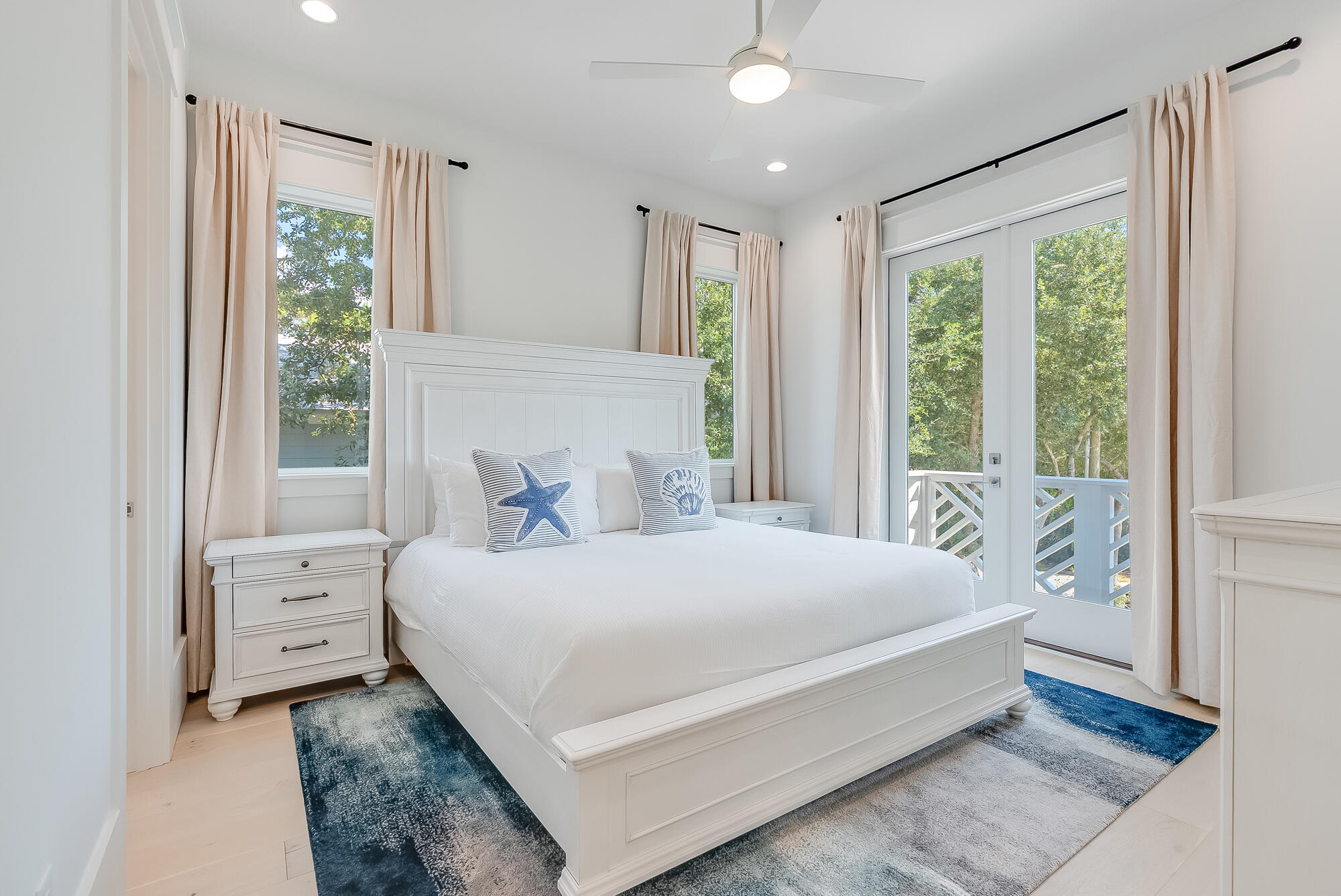212 South Gulf Drive Santa Rosa Beach, FL 32459 - Photo 29 of 68 a large bed sitting in a bedroom next to a window