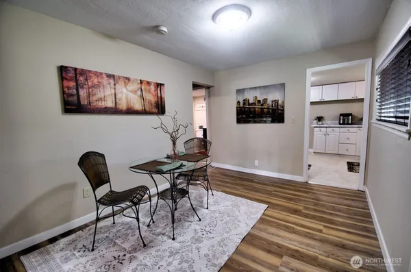 a workspace with furniture and window