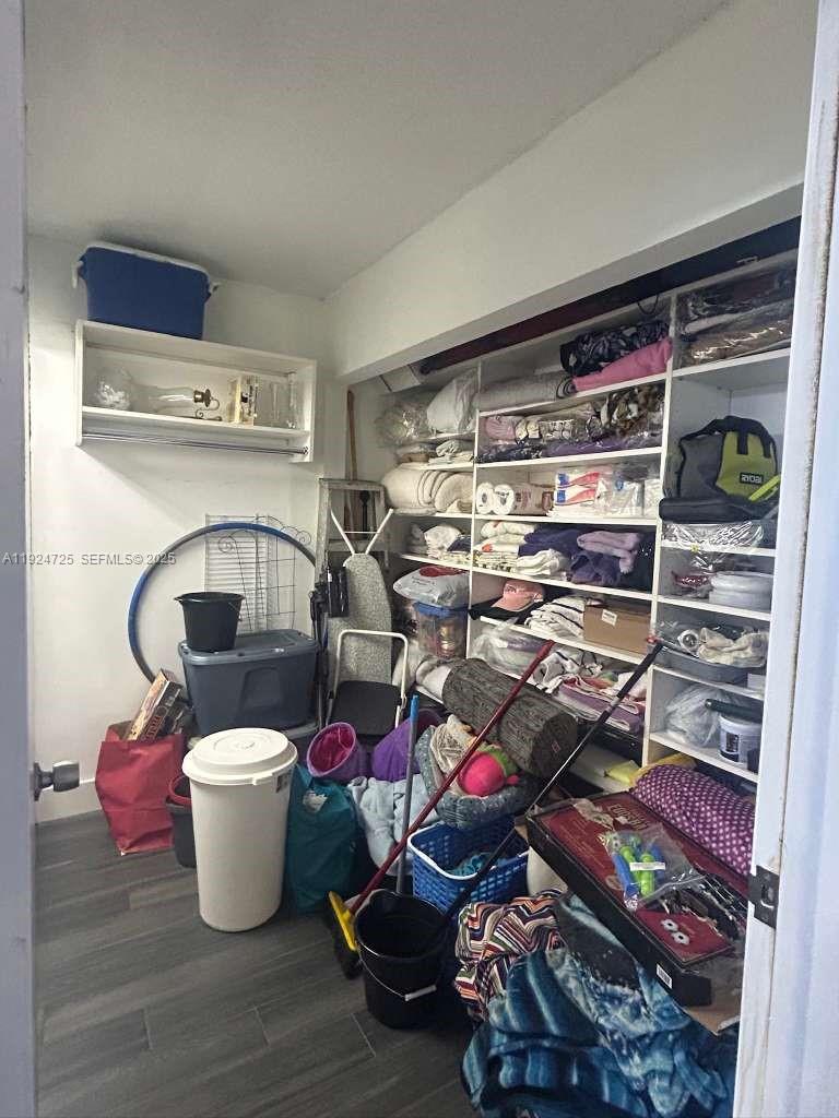 8020 Hampton Boulevard, Unit 202 North Lauderdale, FL 33068 - Photo 23 of 26 a room with storage and utility