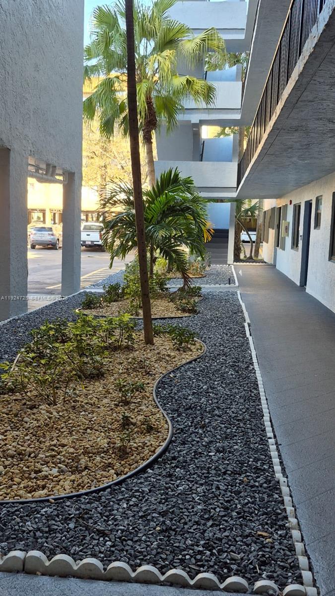 8020 Hampton Boulevard, Unit 202 North Lauderdale, FL 33068 - Photo 3 of 26 a view of a porch