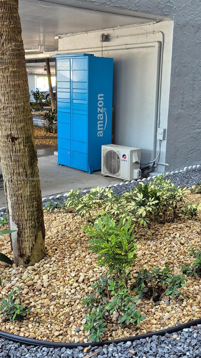 8020 Hampton Boulevard, Unit 202 North Lauderdale, FL 33068 - Photo 4 of 26 a view of a wooden door and chair