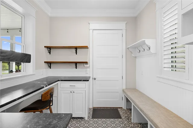 a kitchen with a sink and cabinets