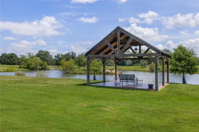 a view of swimming pool is middle in the middle of a lake