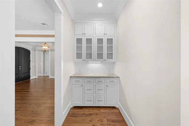 a view of cabinets with wooden floor and cabinet
