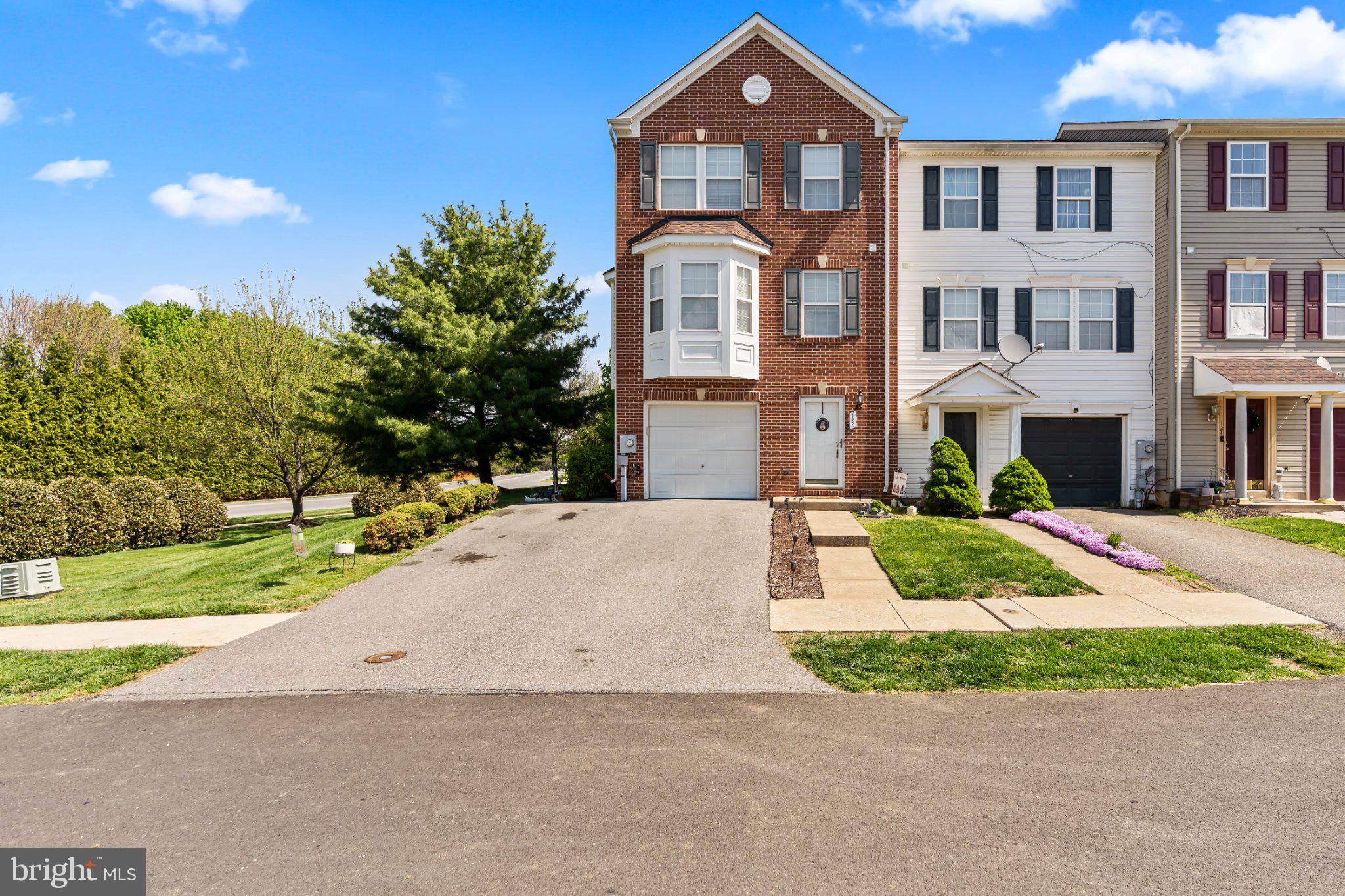 128 Sentry Ridge Smithsburg, MD 21783 - Photo 1 of 41 a front view of a house with a yard and garage
