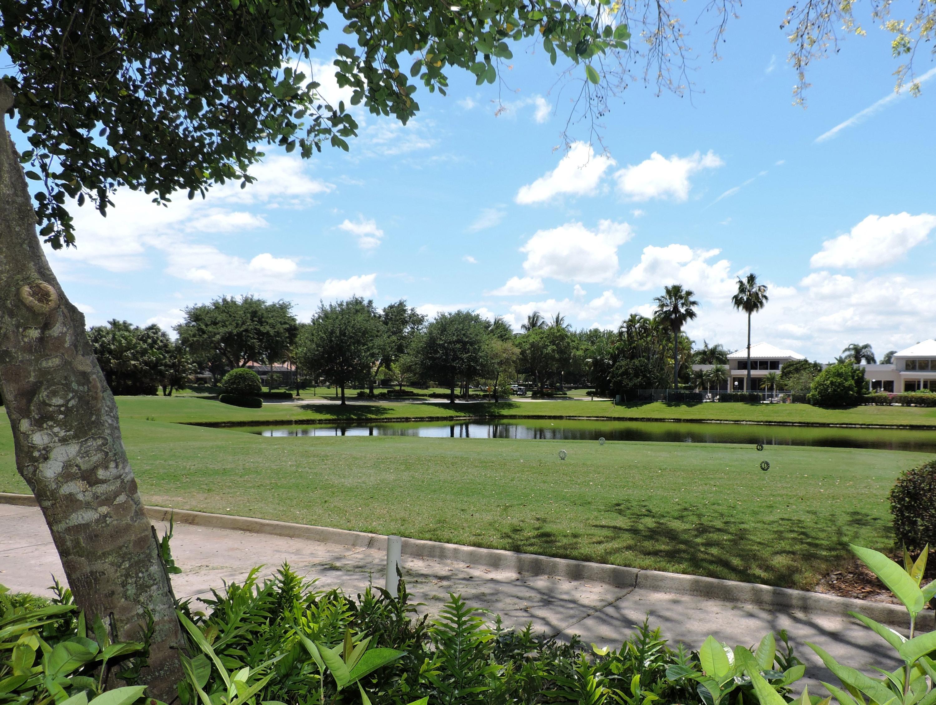 a view of a golf course with a garden