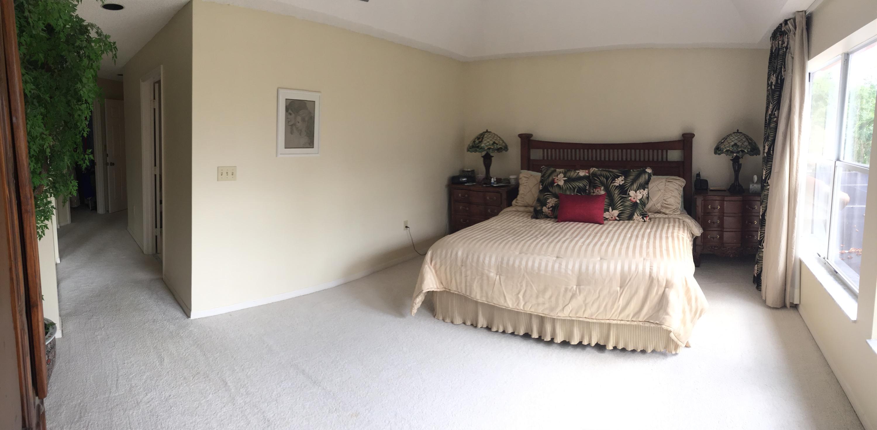 5254 Windsor Parke Drive Boca Raton, FL 33496 - Photo 16 of 25 a bedroom with a bed and a large window