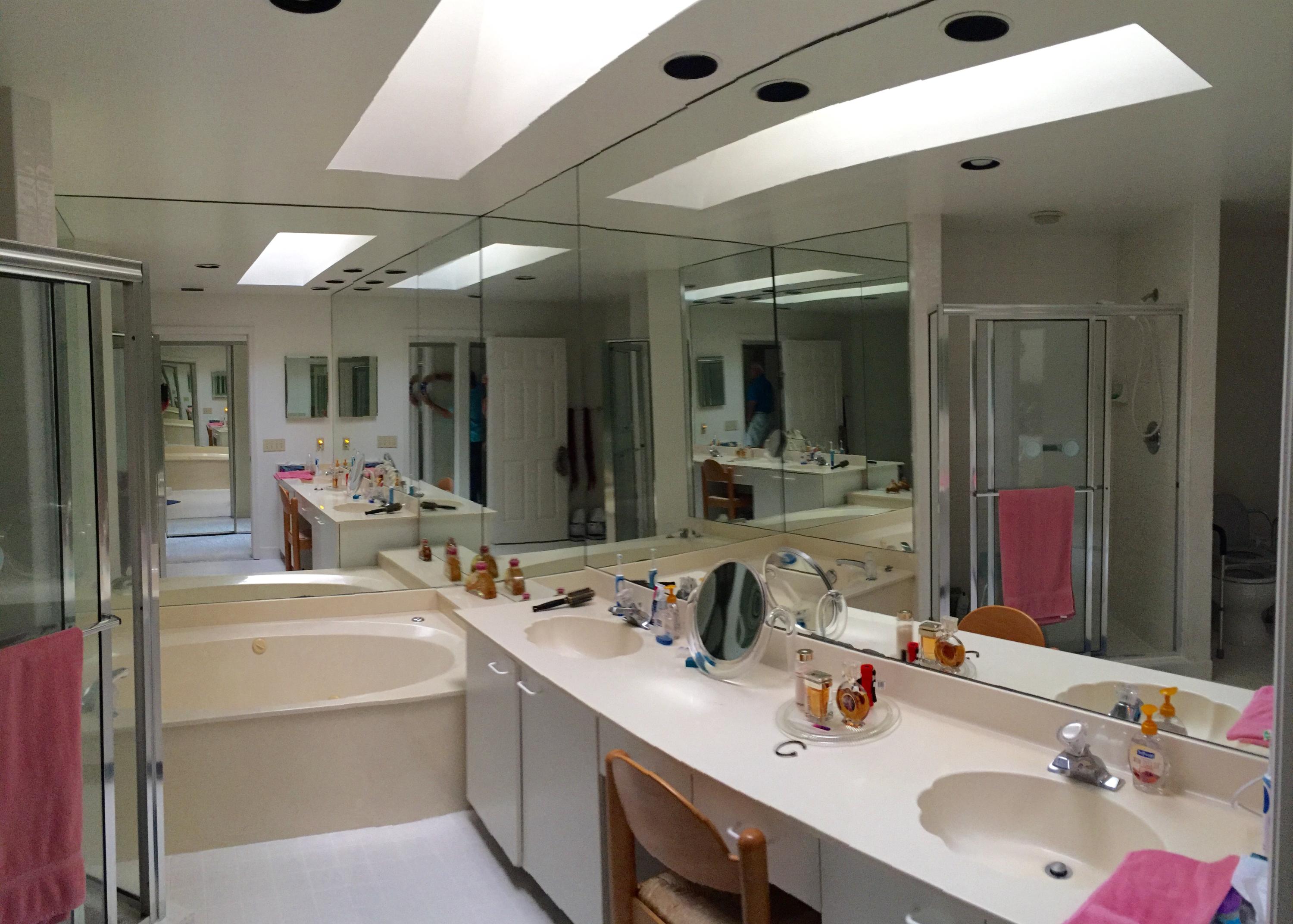 5254 Windsor Parke Drive Boca Raton, FL 33496 - Photo 18 of 25 a bathroom with a sink double vanity and a mirror
