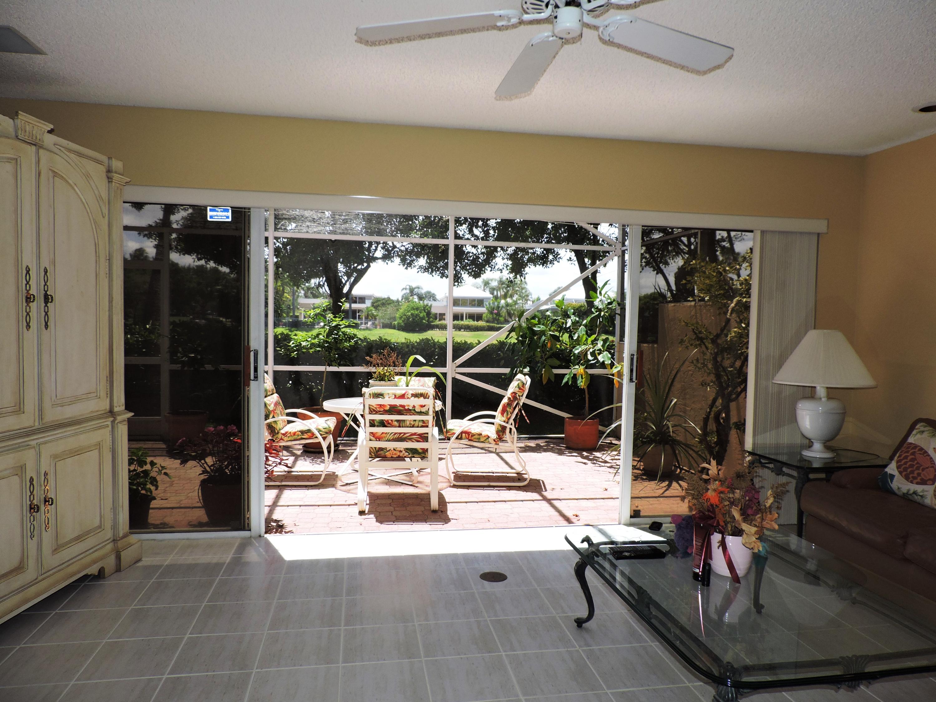 5254 Windsor Parke Drive Boca Raton, FL 33496 - Photo 23 of 25 a view of swimming pool with seating area