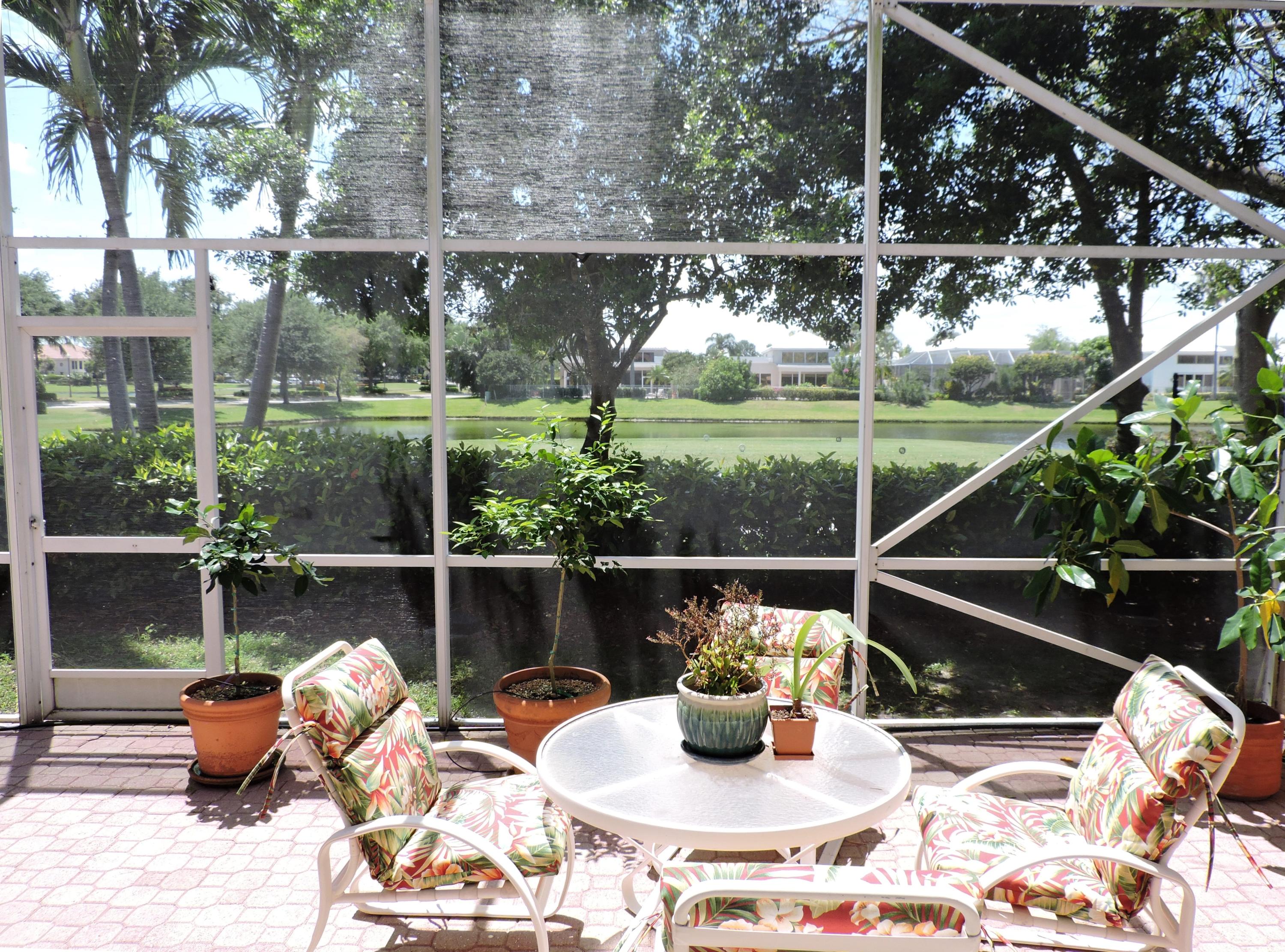 5254 Windsor Parke Drive Boca Raton, FL 33496 - Photo 24 of 25 a outdoor view with a sitting space