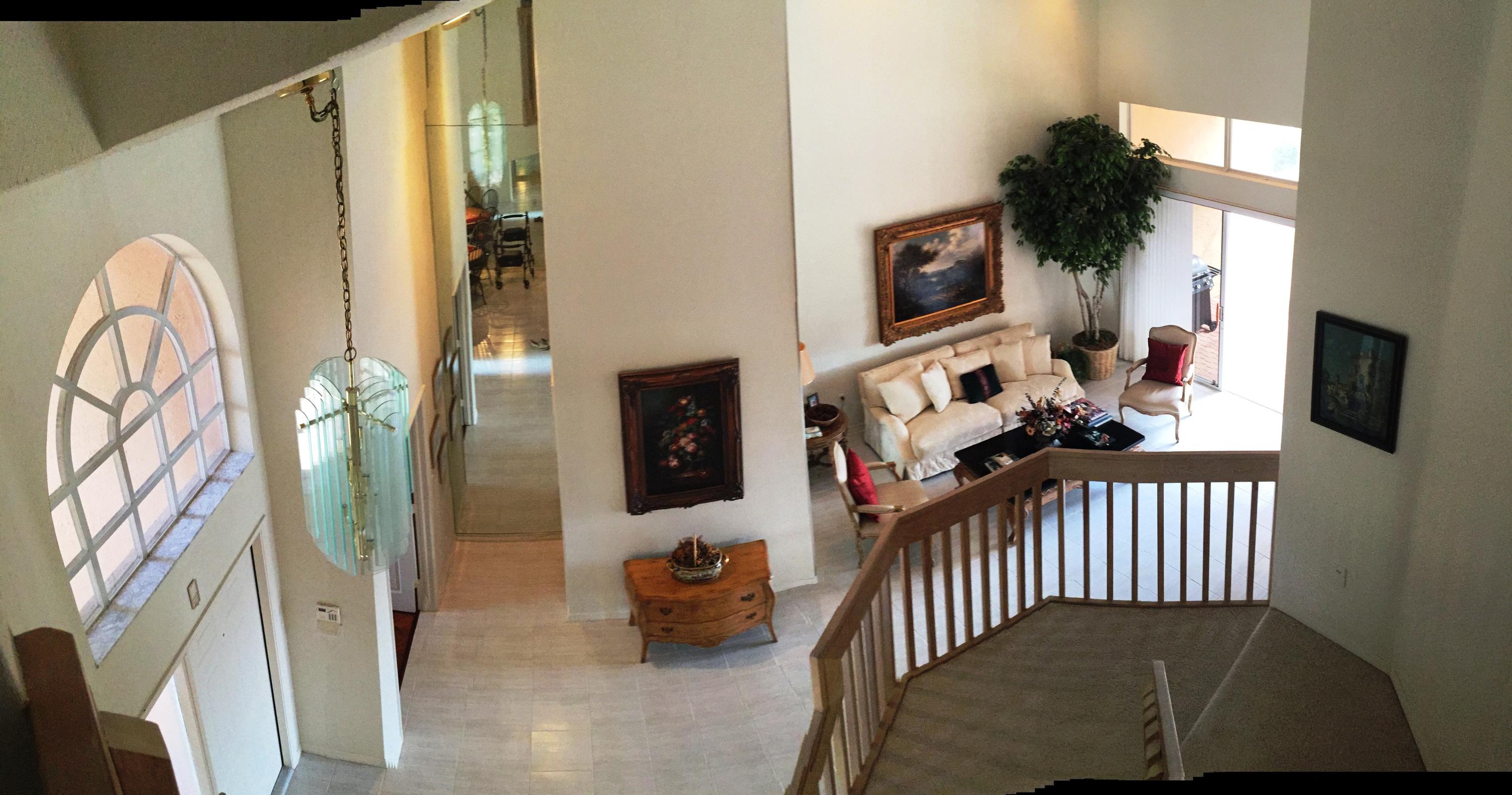5254 Windsor Parke Drive Boca Raton, FL 33496 - Photo 4 of 25 a view of a porch with furniture and floor to ceiling window