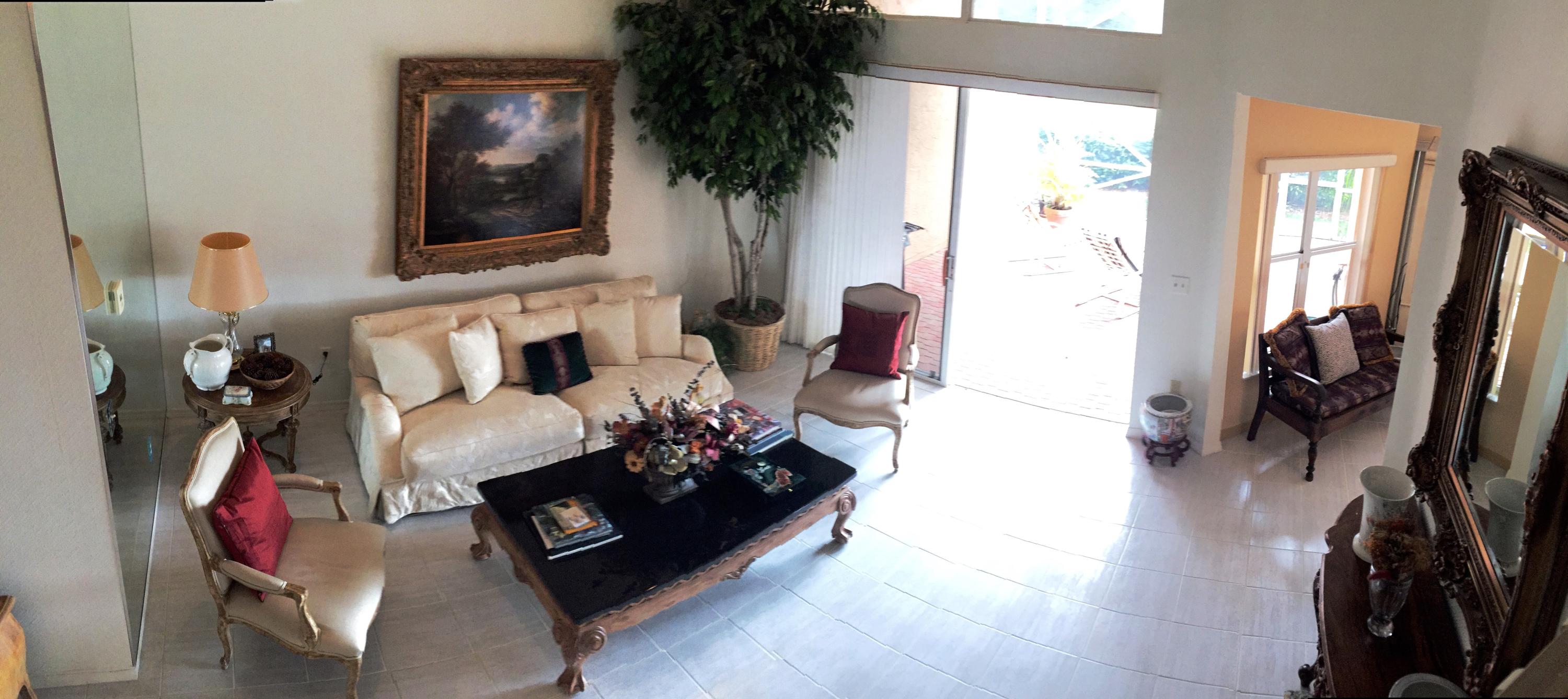 5254 Windsor Parke Drive Boca Raton, FL 33496 - Photo 7 of 25 a living room with furniture and a potted plant
