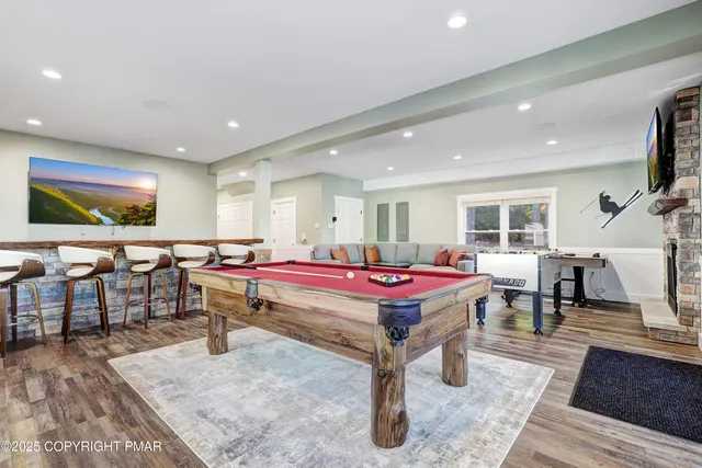 a bedroom with bed and a chandelier