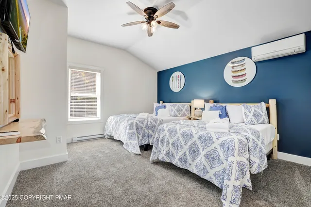 a view of a hallway view with wooden floor and staircase