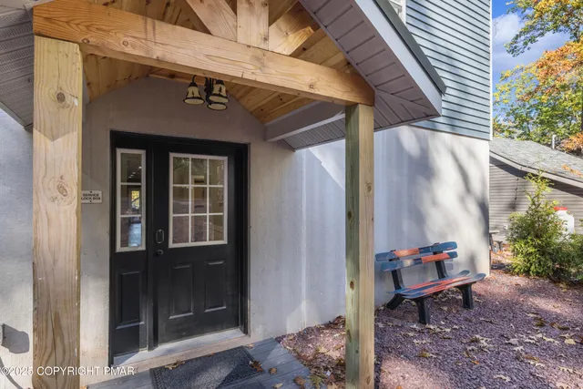 a kitchen with stainless steel appliances a stove a microwave and sink