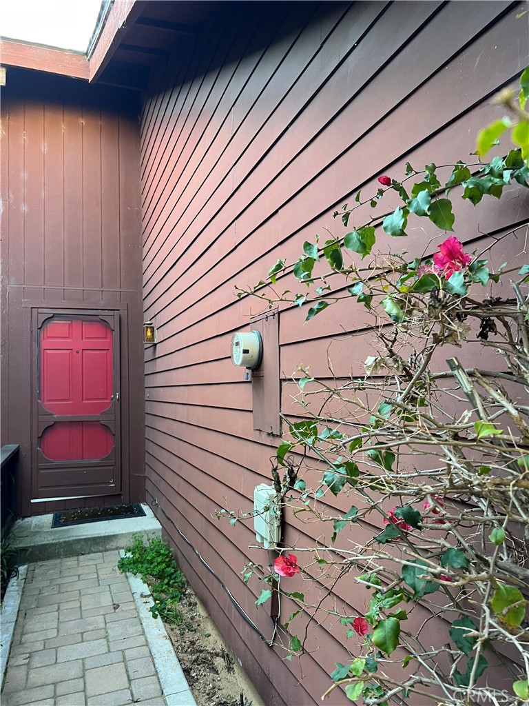 119 Le Point Street Arroyo Grande, CA 93420 - Photo 1 of 1 a potted plant sitting in front of a door