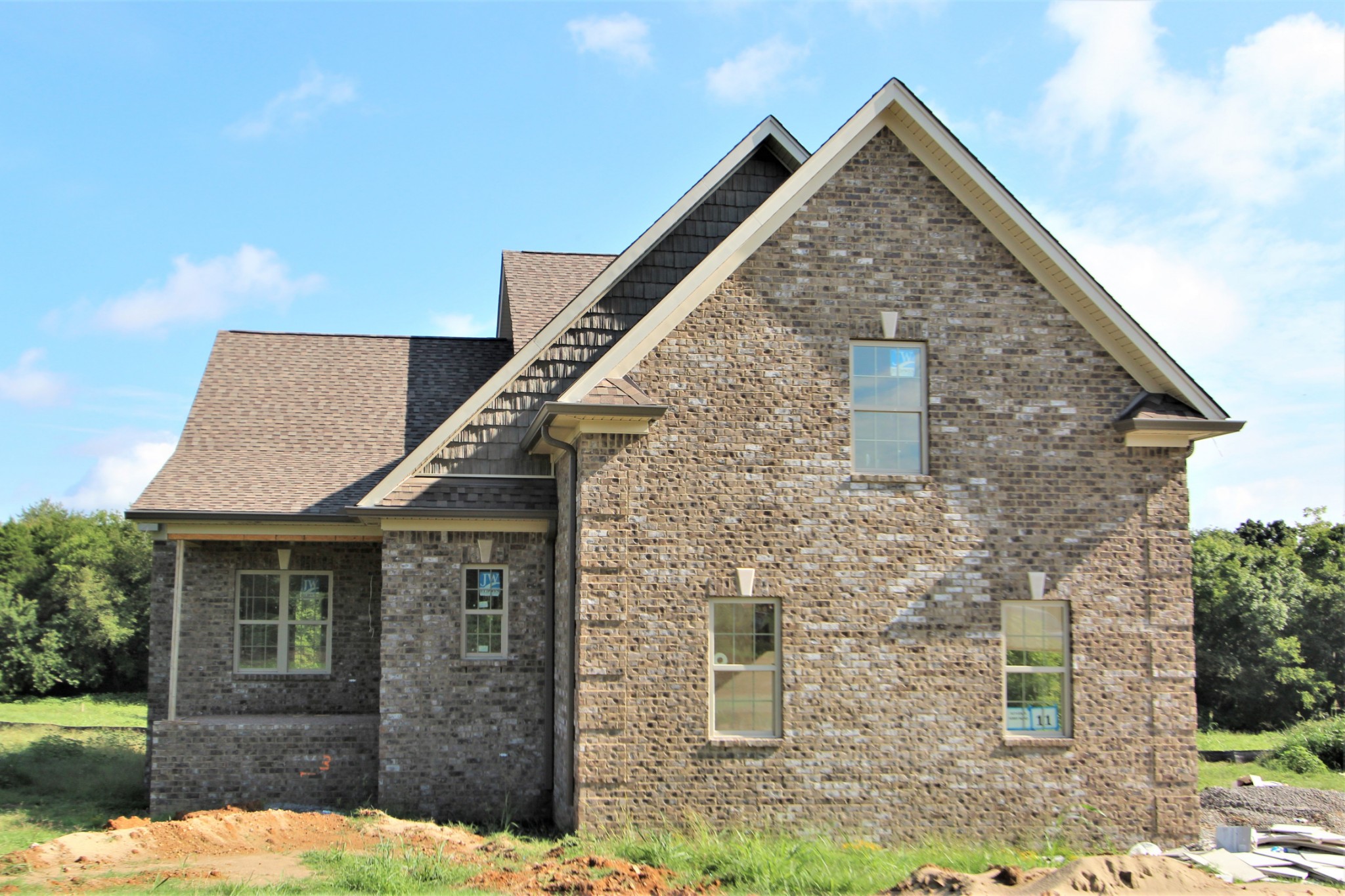 517 Cole's Ferry Road, Unit 11 Gallatin, TN 37066 - Photo 1 of 16 a front view of a house with a yard