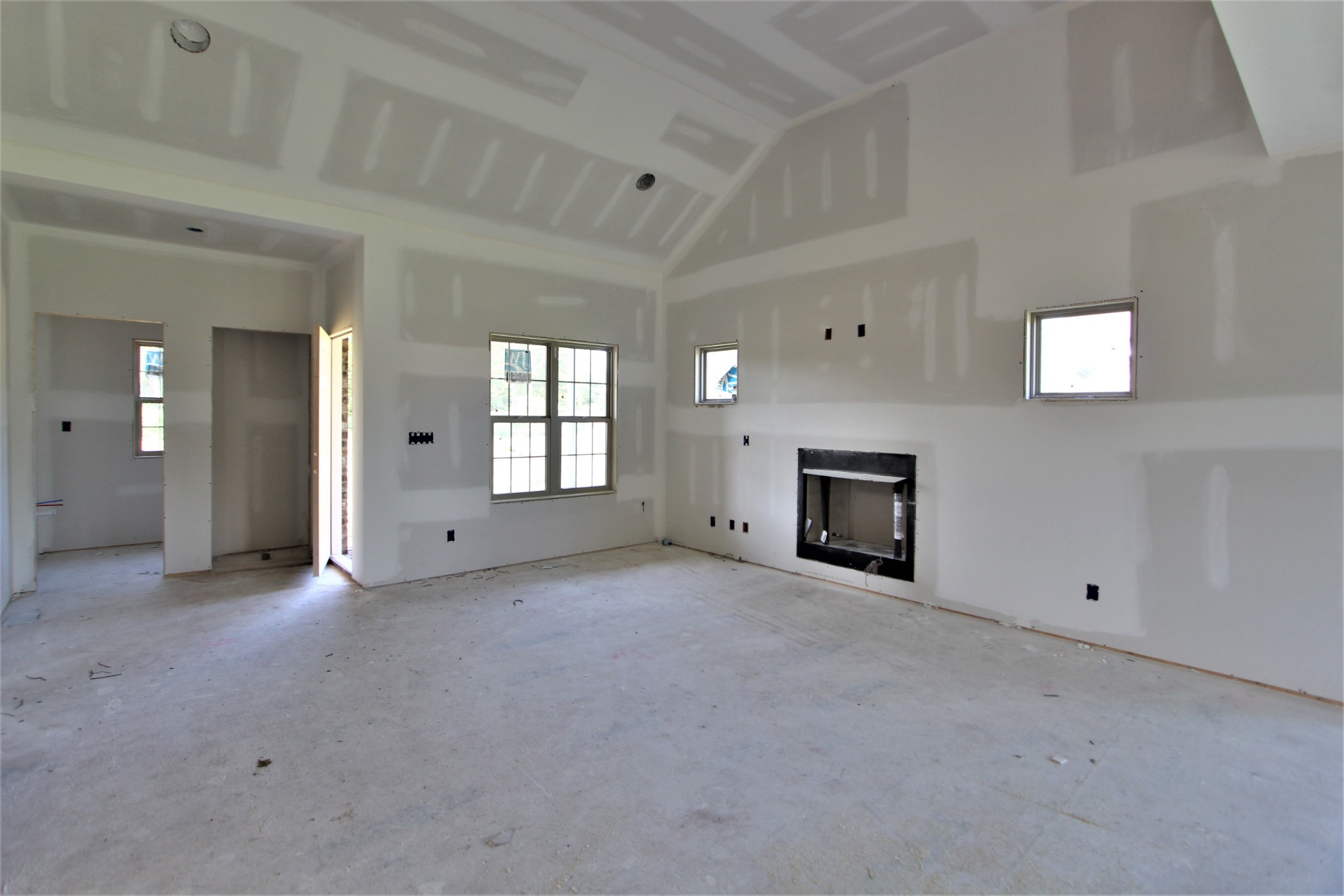 517 Cole's Ferry Road, Unit 11 Gallatin, TN 37066 - Photo 2 of 16 an empty room with windows and fireplace