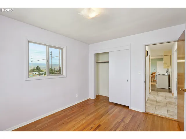 a view of an empty room and window