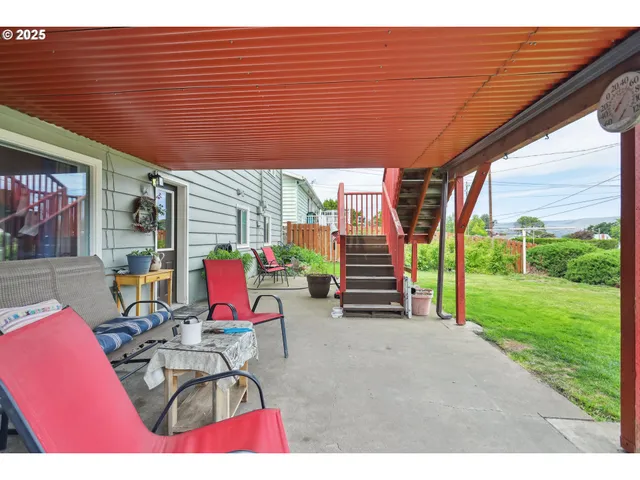 a view of swimming pool with a patio