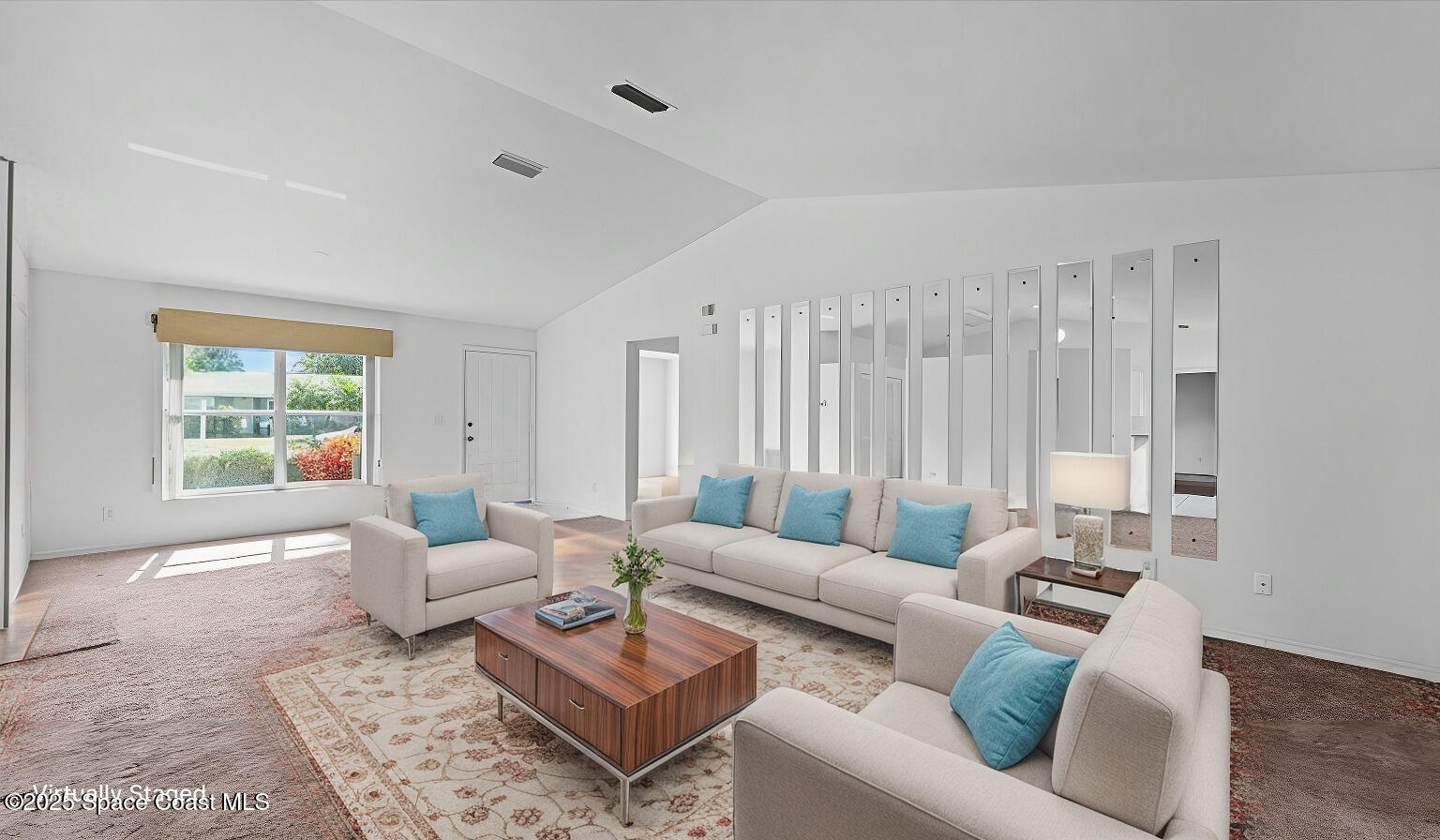 212 Crystal Lake Road Melbourne, FL 32901 - Photo 8 of 38 a living room with furniture and a large window
